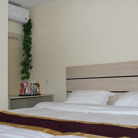 Dalian Kai Bin Business Inn Далянь Екстер'єр фото