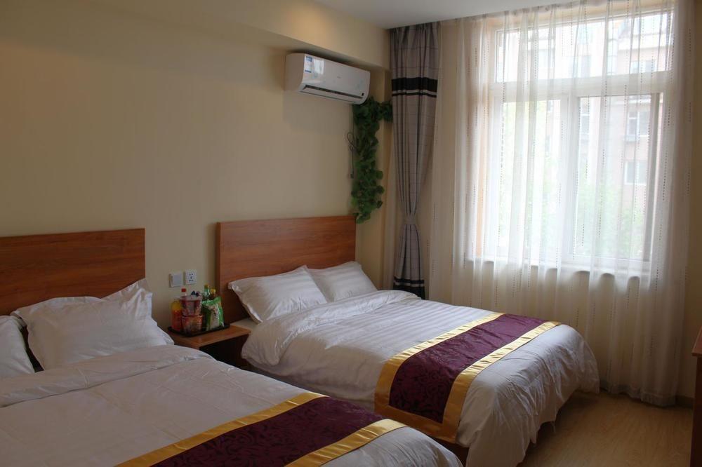 Dalian Kai Bin Business Inn Далянь Екстер'єр фото