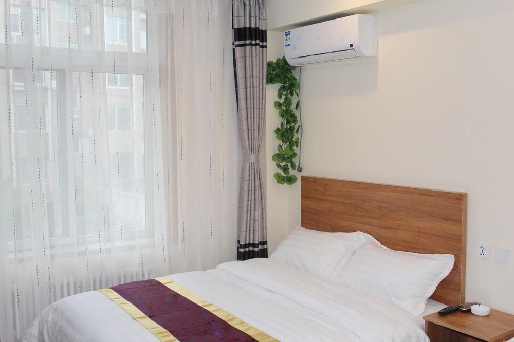 Dalian Kai Bin Business Inn Далянь Екстер'єр фото